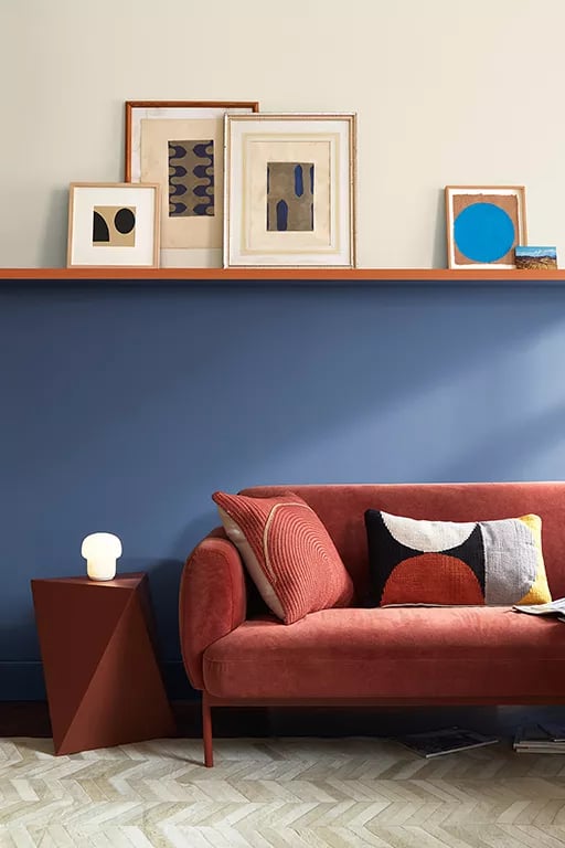 Dark-Blue-Paint-Wall-Color-Red-Couch-512x768px